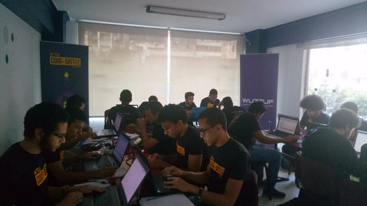 Contestants coding at the Code Battle semi-final in Alexandria