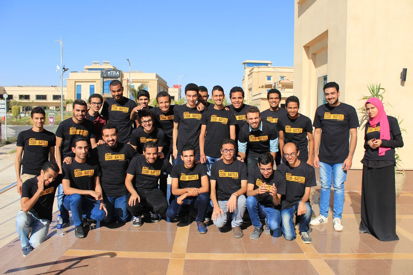 Assiut semi-finalists outside the venue