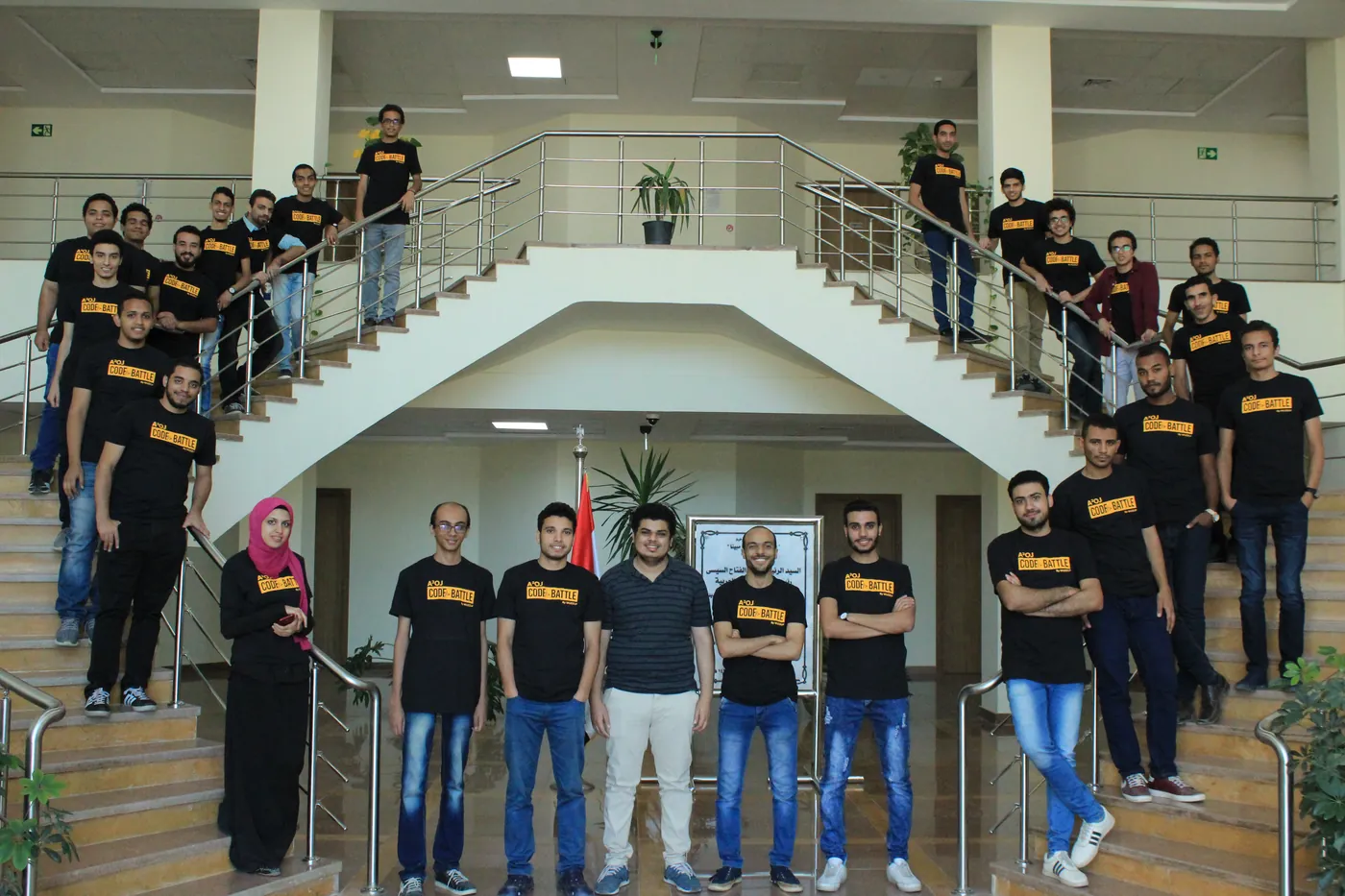 Assiut semi-finalists on the venue stairs