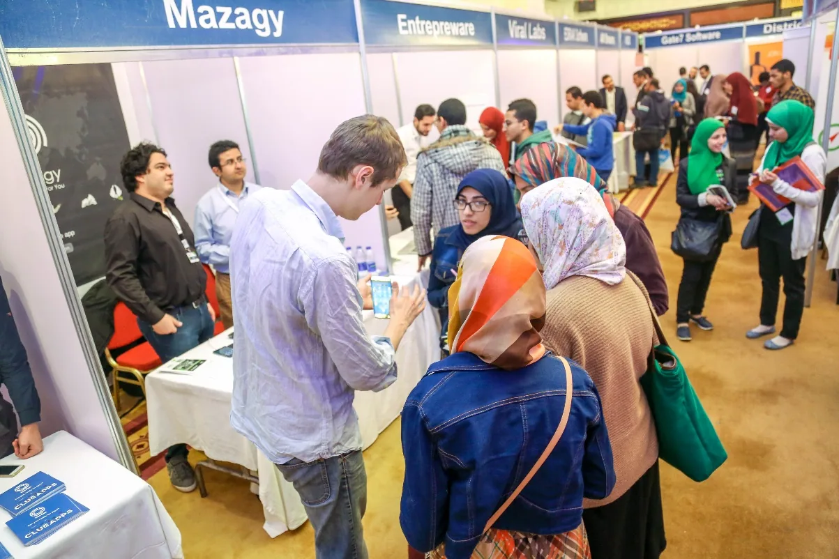 Job seekers at company booths